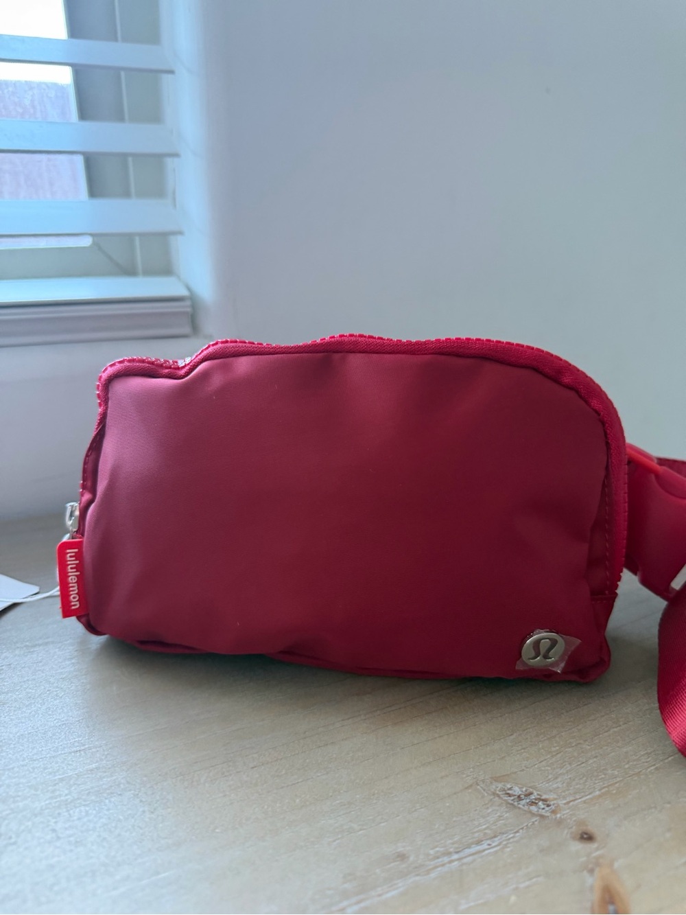 lululemon athletica red crossbody belt bag